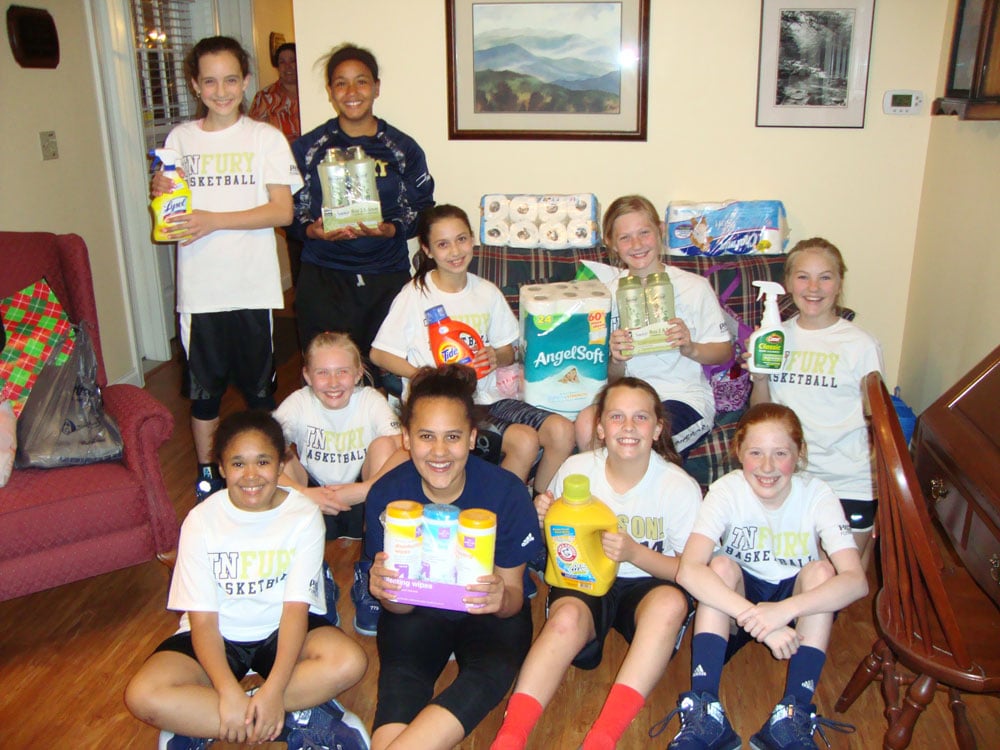 The Gold TN Fury, a fifth grade girls’ basketball team, recently visited the Hospitality Houses to deliver items they had collected as part of their team’s service project.