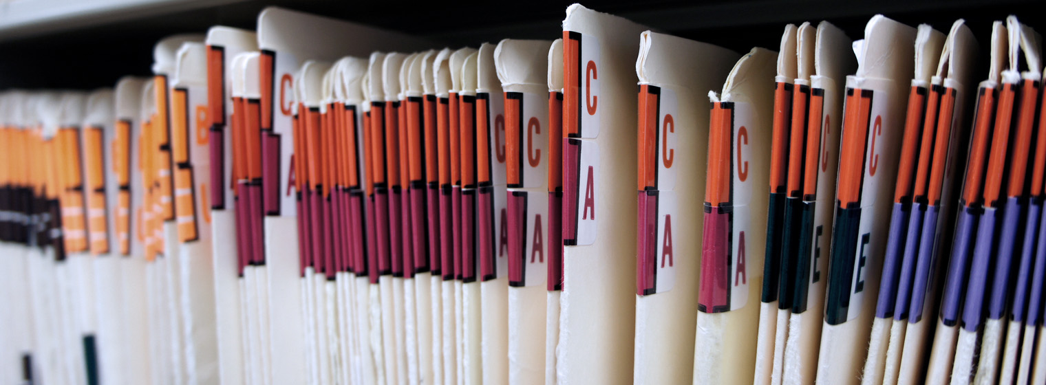 a shelf full of medical records