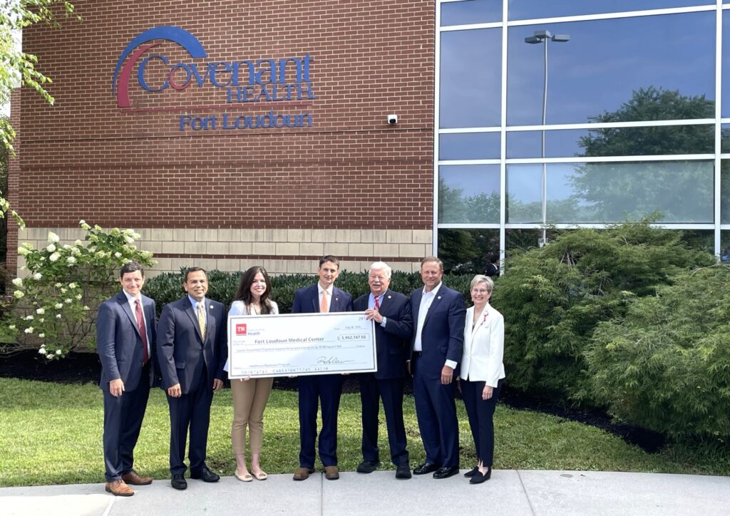 TN Dept of Health representatives with Lt. Gov Randy McNally and Covenant Health leaders in front of hospital at check presentation for Fort Loudoun Medical Center expansion project