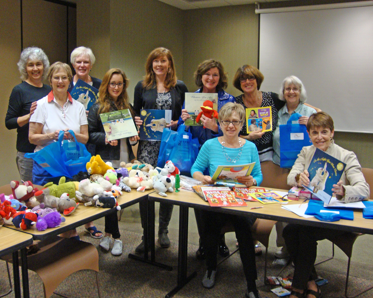 Altrusa-members-stuffing-bags-for-kids Altrusa stuffing bags at MMC