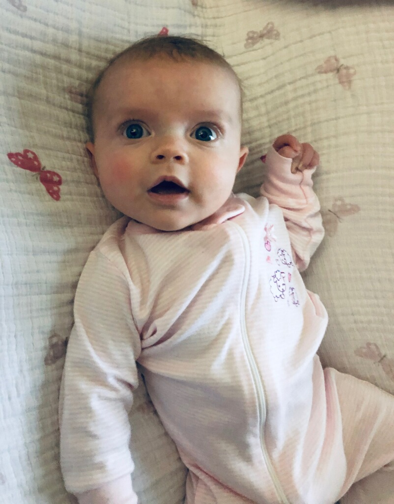 Baby Melody Lay looks at the camera