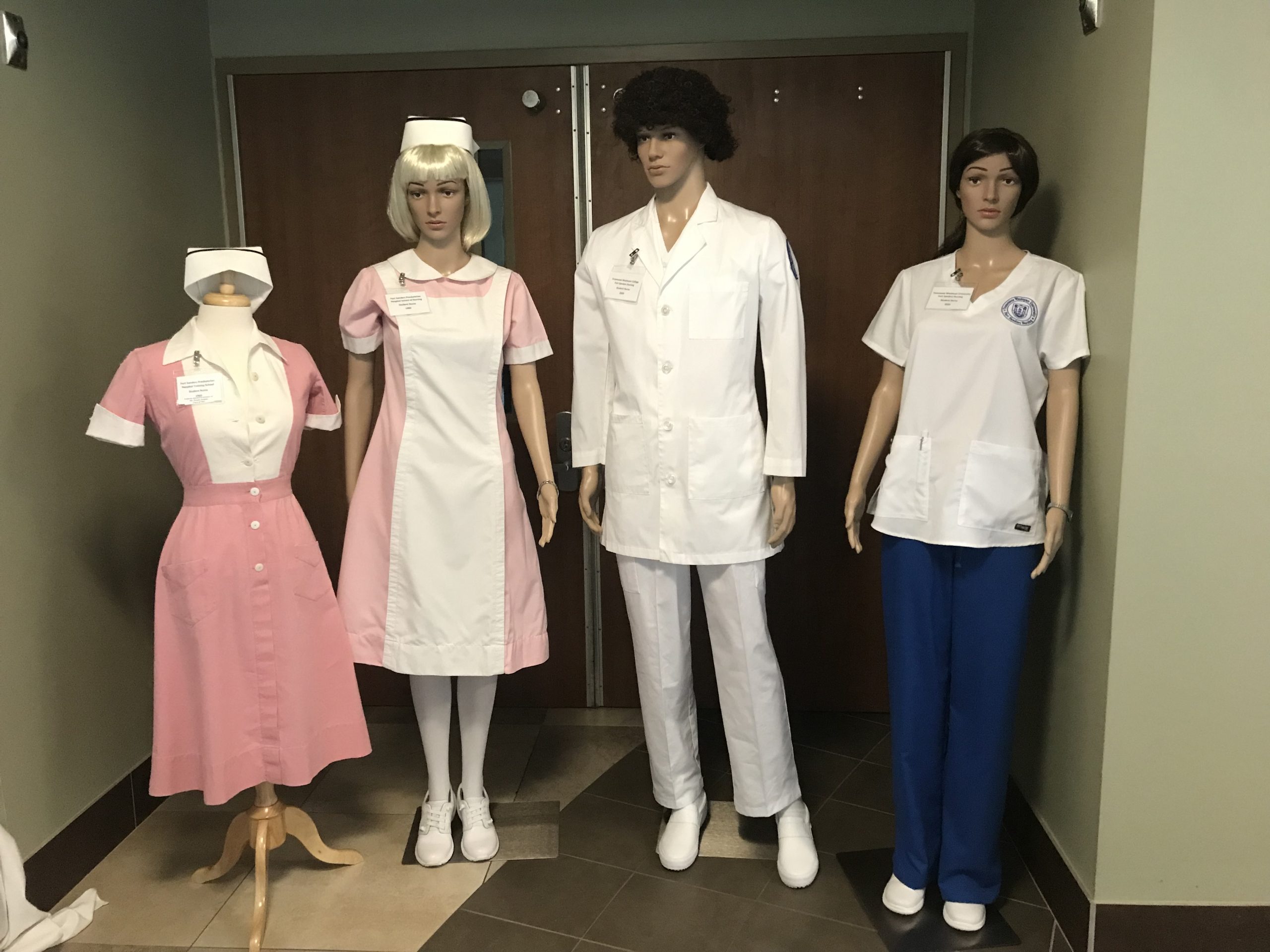 Four nursing uniforms assembled for Fort Sanders Regional's 100th Anniversary Celebration