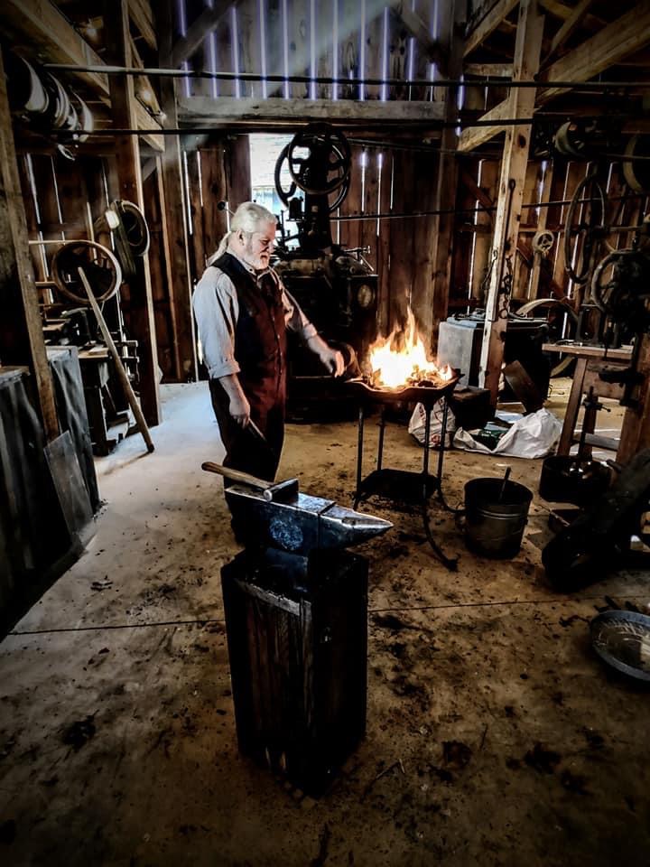 Michael Ensor as a blacksmith