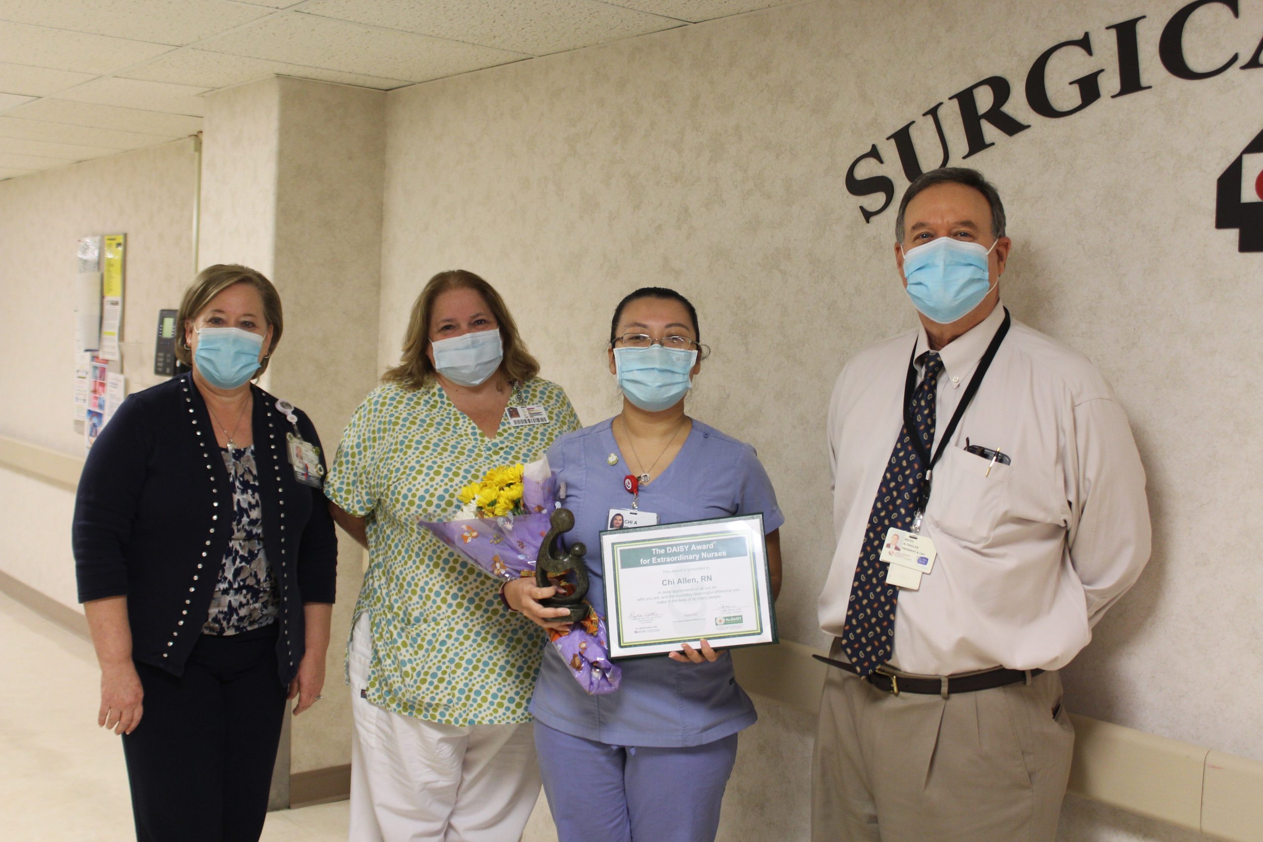 Chi Allen receiving her DAISY award