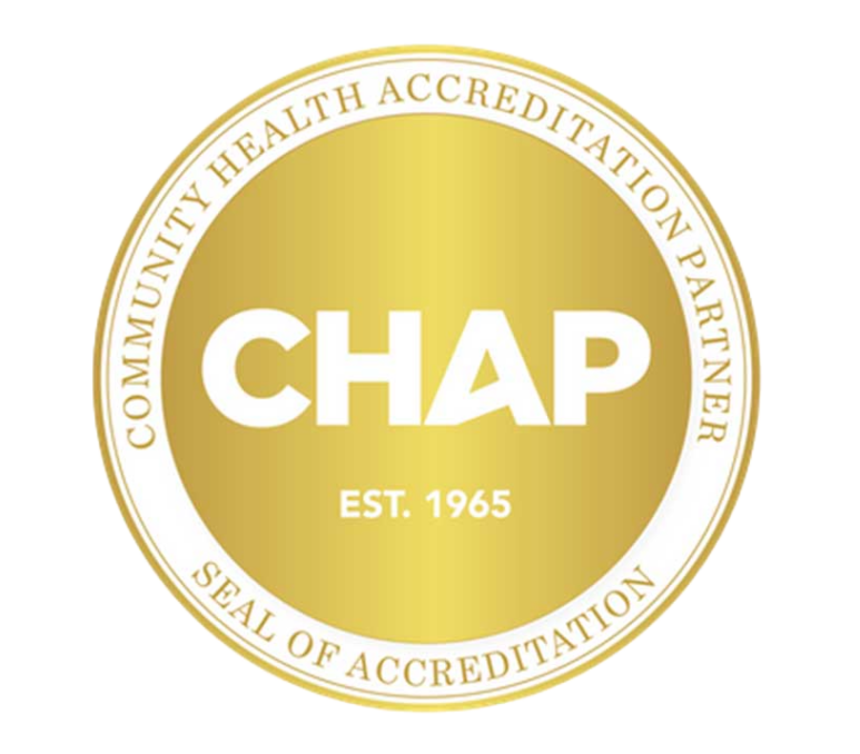 Gold circular seal with CHAP in bold white letters at the center, EST. 1965 below it, and the words Community Health Accreditation Partner and Seal of Accreditation around the edge.
