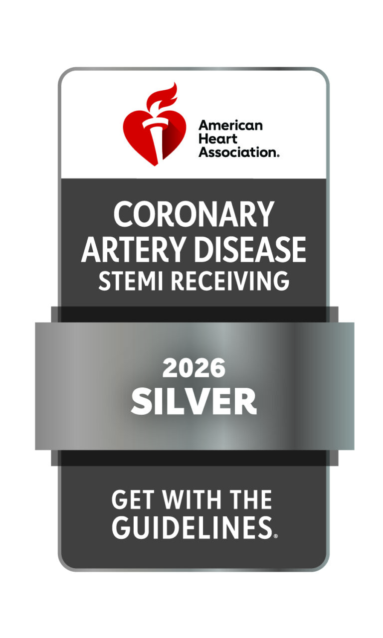 American Heart Association badge: “Coronary Artery Disease STEMI Receiving 2026 Silver Get With The Guidelines.” Featuring a silver ribbon across the center and a red heart torch logo at the top, this prestigious badge highlights Cumberland Medical Center’s commitment to excellence in cardiac care.