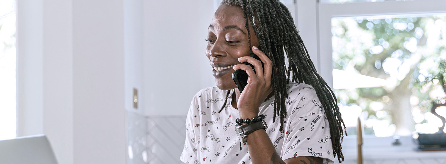 female speaking on the telephone