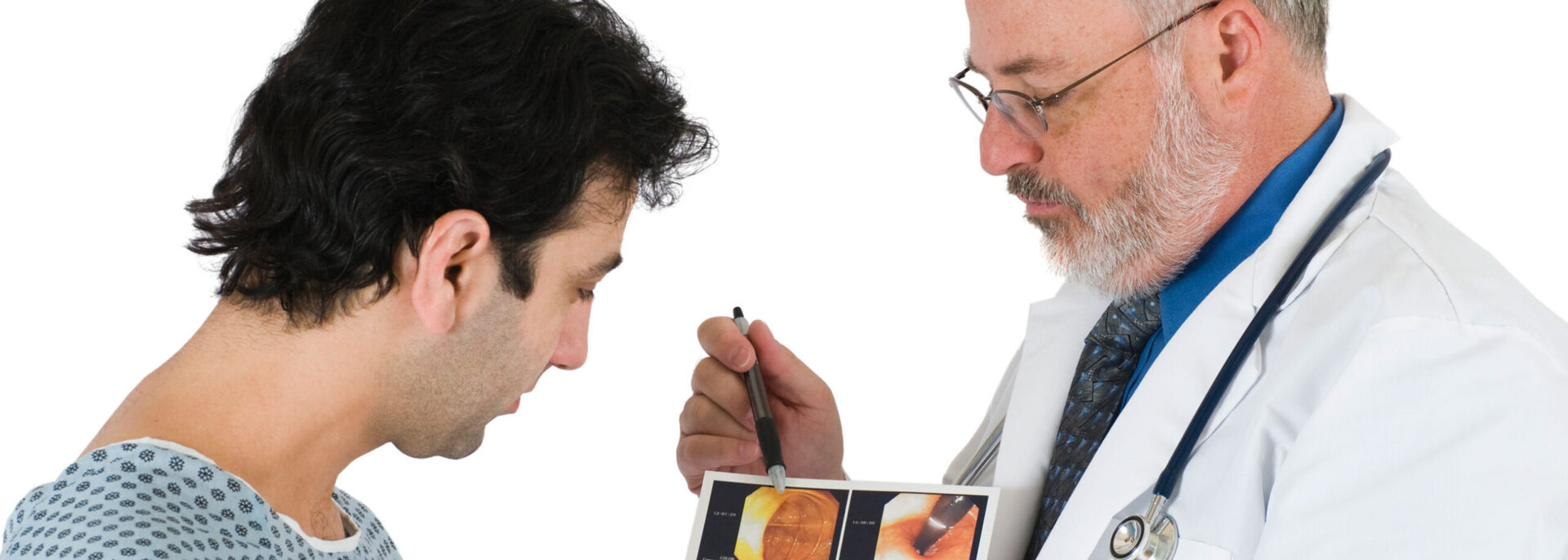 senior doctor shows male patient medical scan