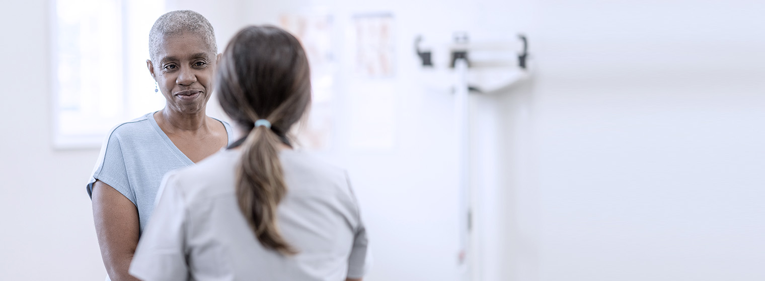 Female physician talks with female patient about women's services at Cumberland Medical Center.