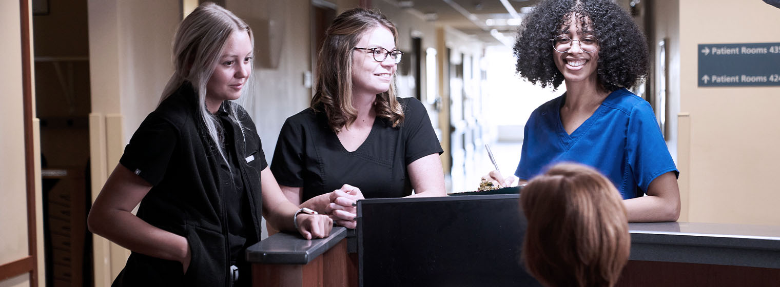 three female employees in a hospital