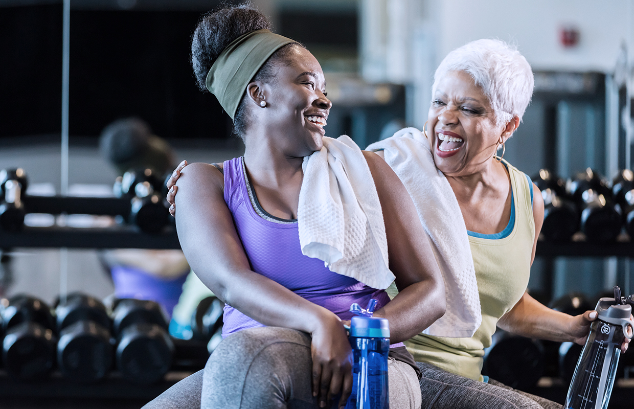 two african-american women at bodyworks doing strength training