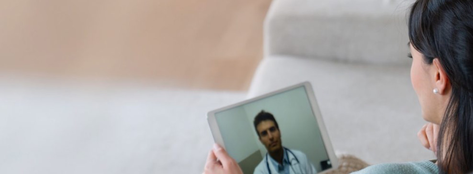 Patient having a virtual appointment with a doctor on an iPad screen