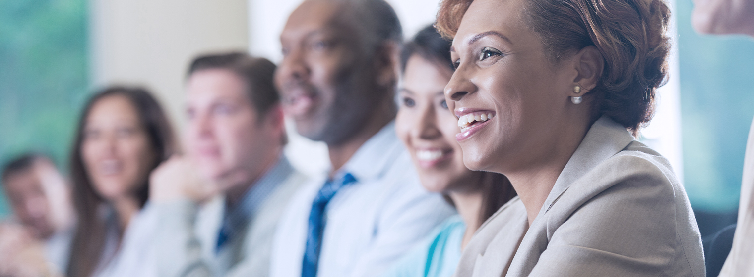 group of adults smiling