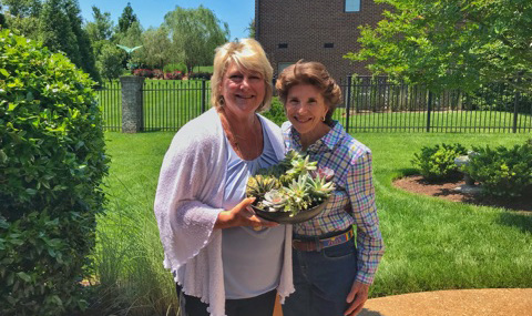 Nancy Piske pictured outside with her sister.