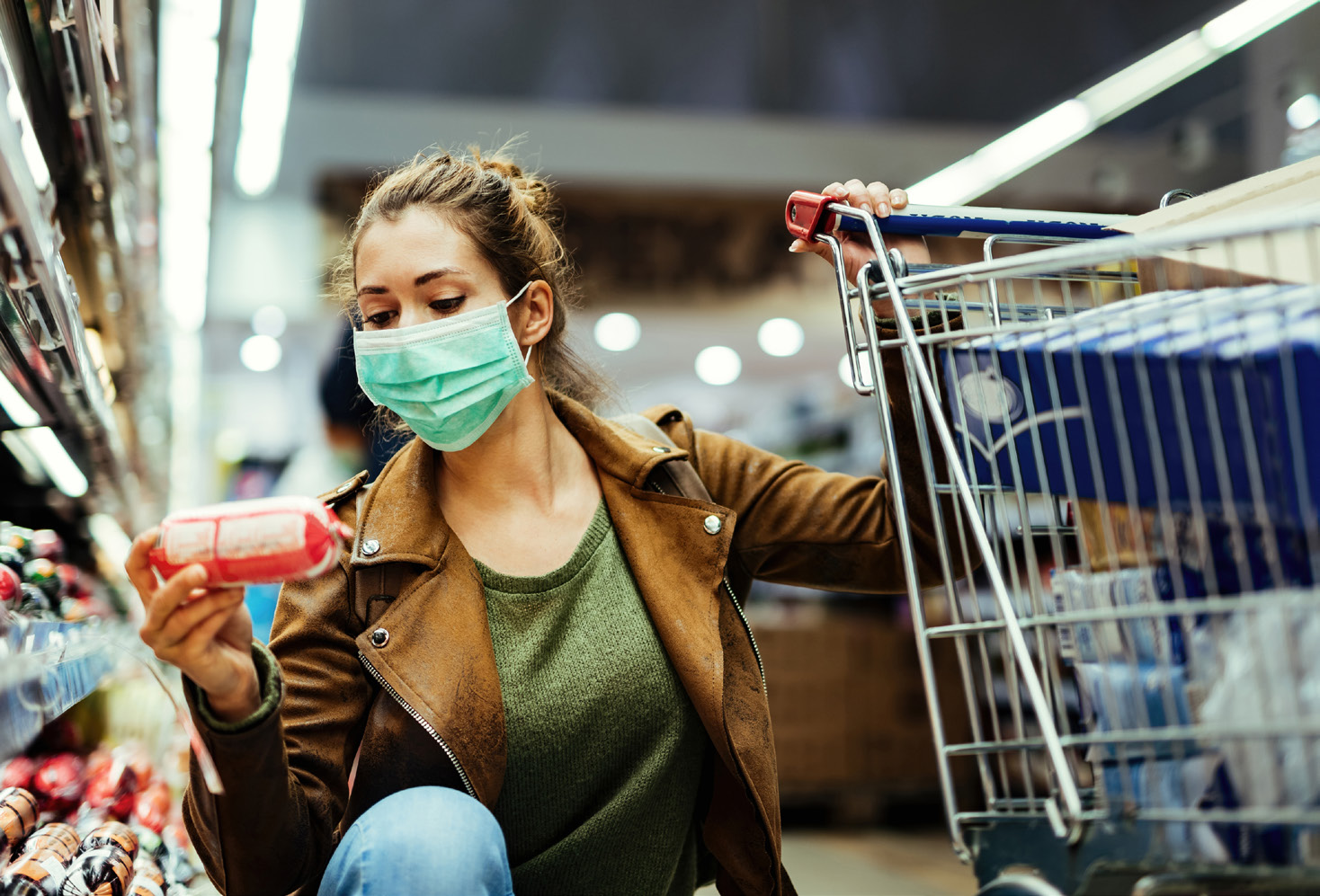 woman reading food label