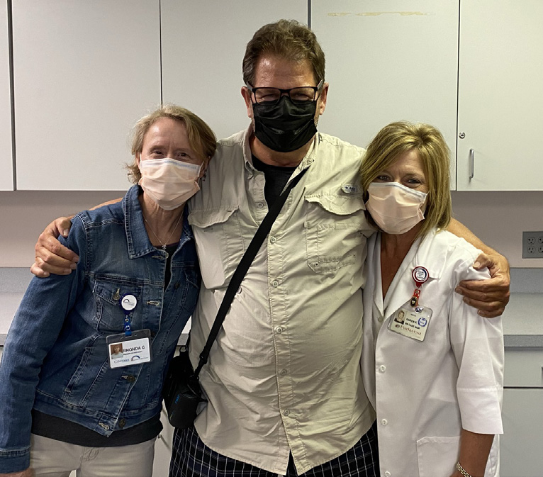 George Moore with Rhonnda Cloinger, MS, CCRP, exercise therapist, left, and Karen Kirkland, RN, certified case manager.