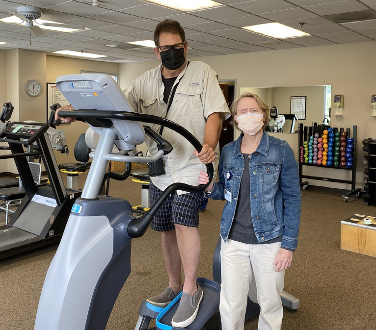 George Moore on exercise bike.