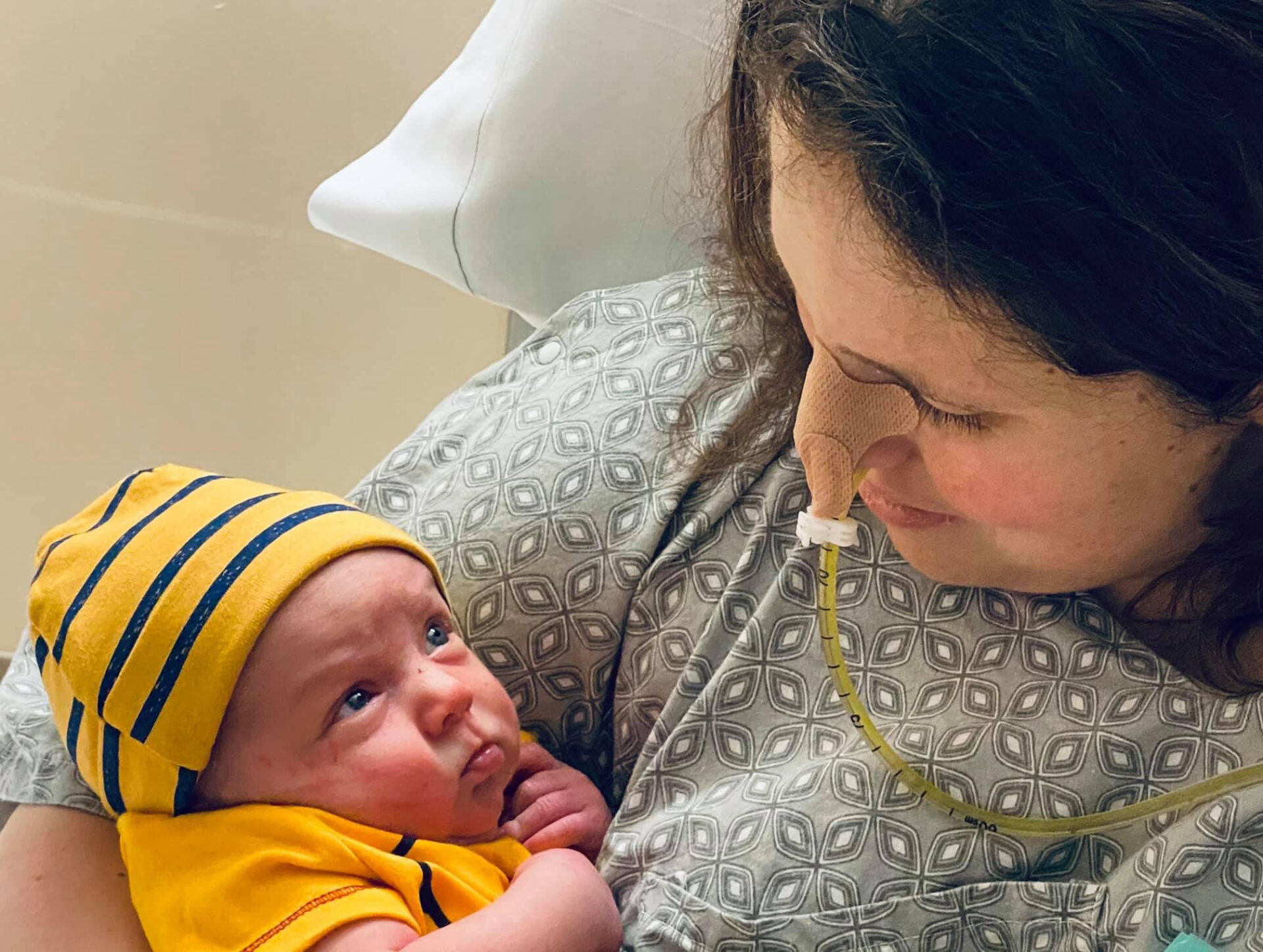Selene holding baby Levi in hospital