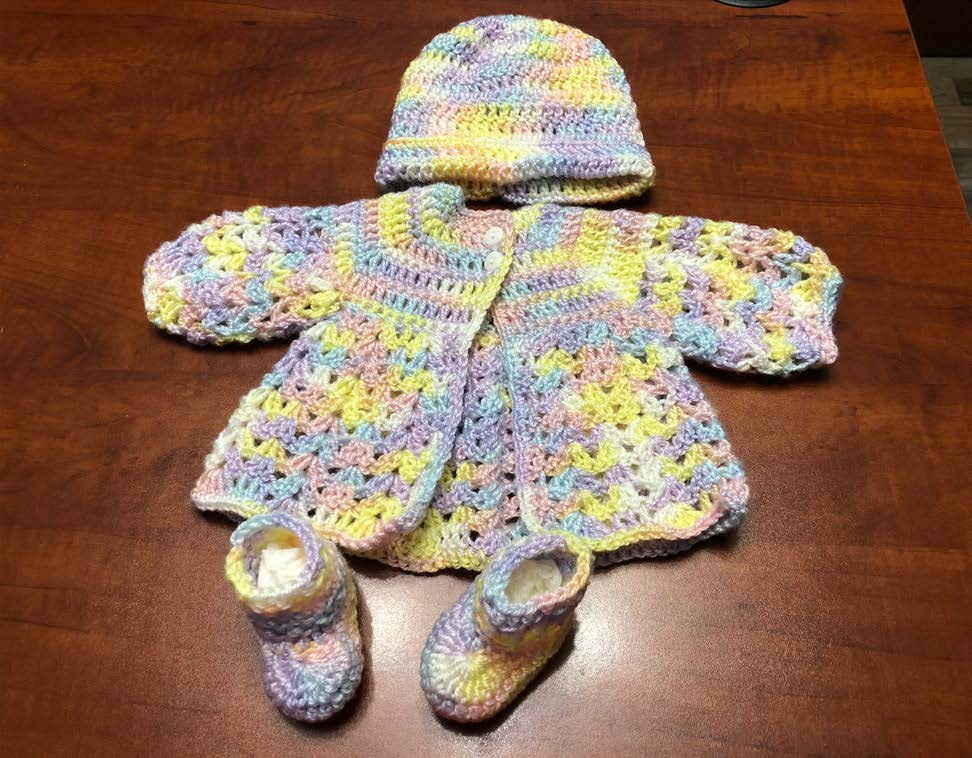 baby outfit crocheted by Freida.