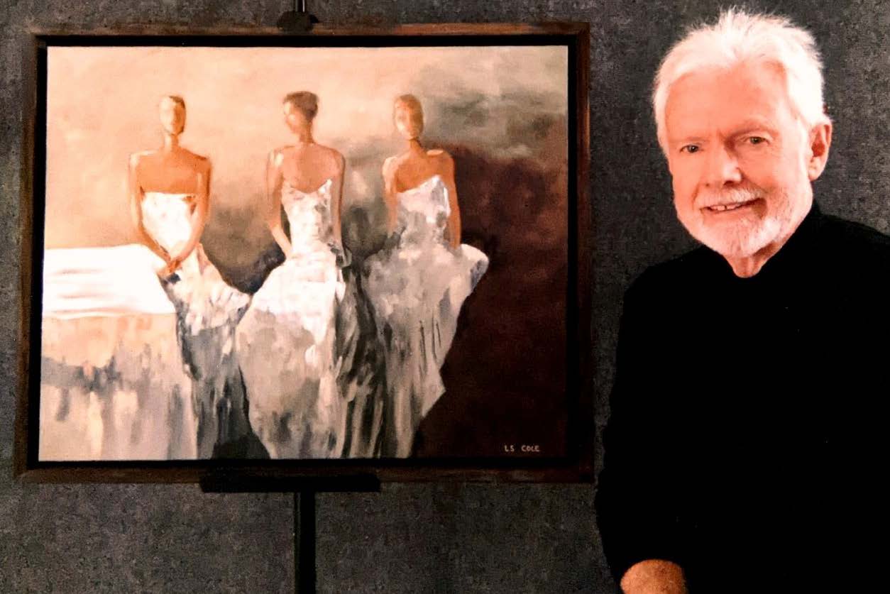 0813-3947 WSSN Arts! Featured Artist Run Date 12.1 Larry Cole poses beside