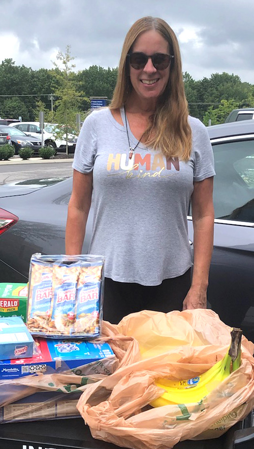 Karen Helton with a snack delivery.