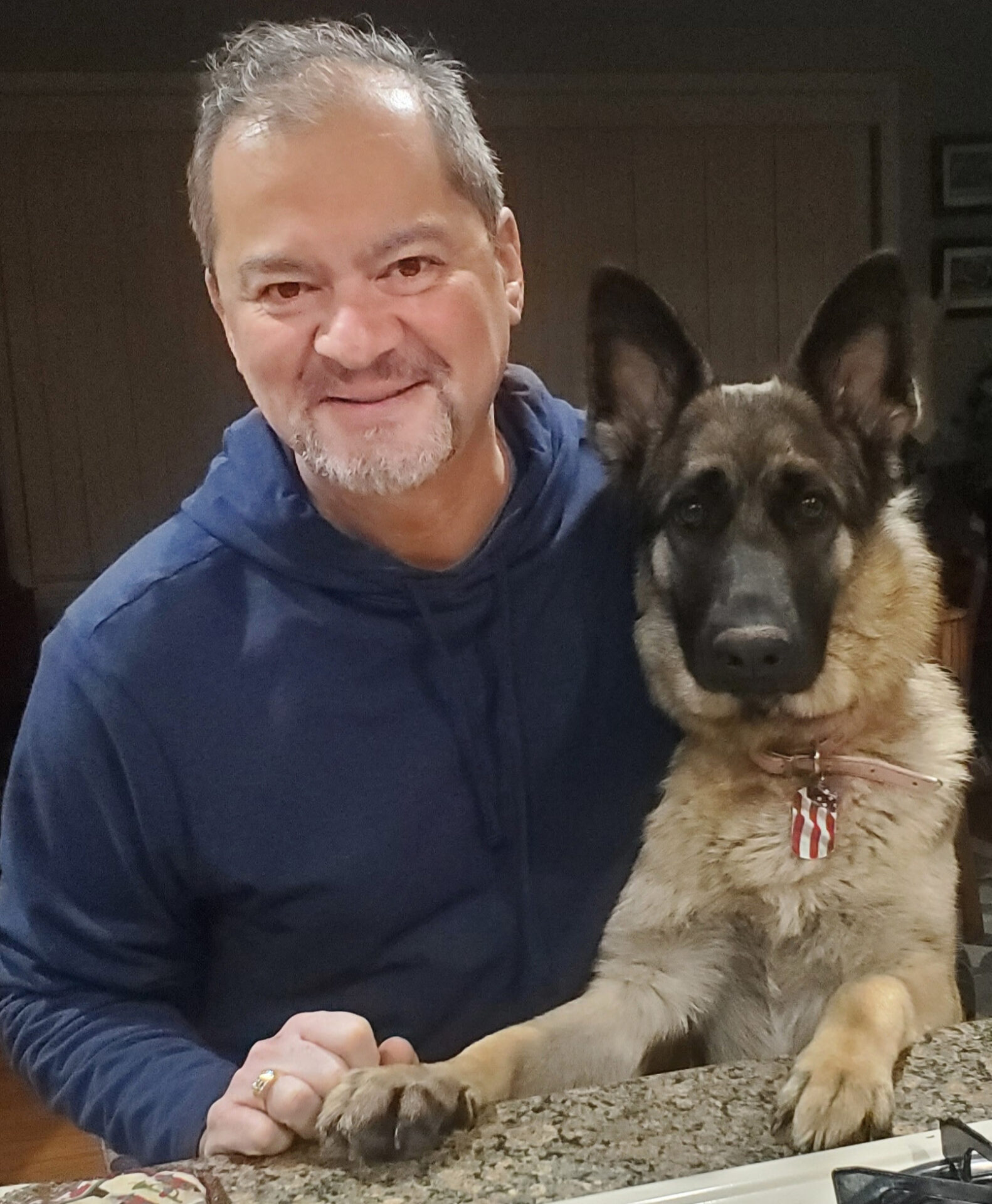 John Gabriel with German Shepherd dog.