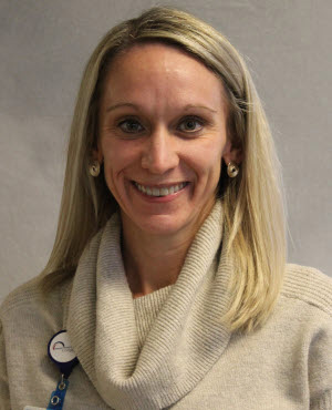 Headshot of PT Margaret Keele in beige sweater.