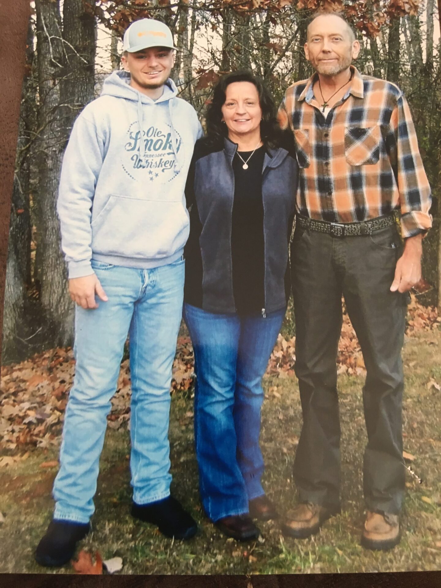 Angelia Johnson with her son and late husband.