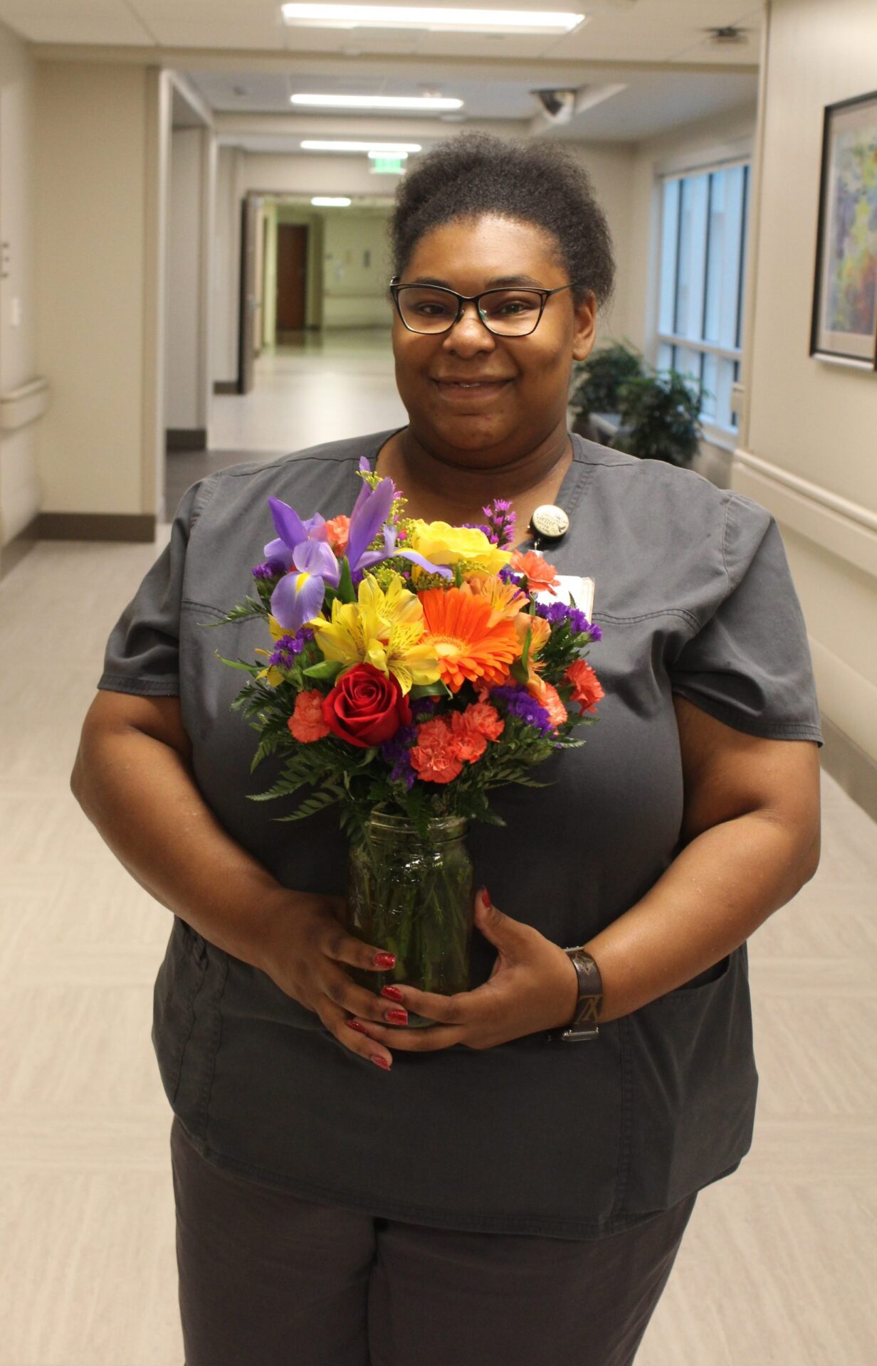 Myleshia Carter holding flowers 