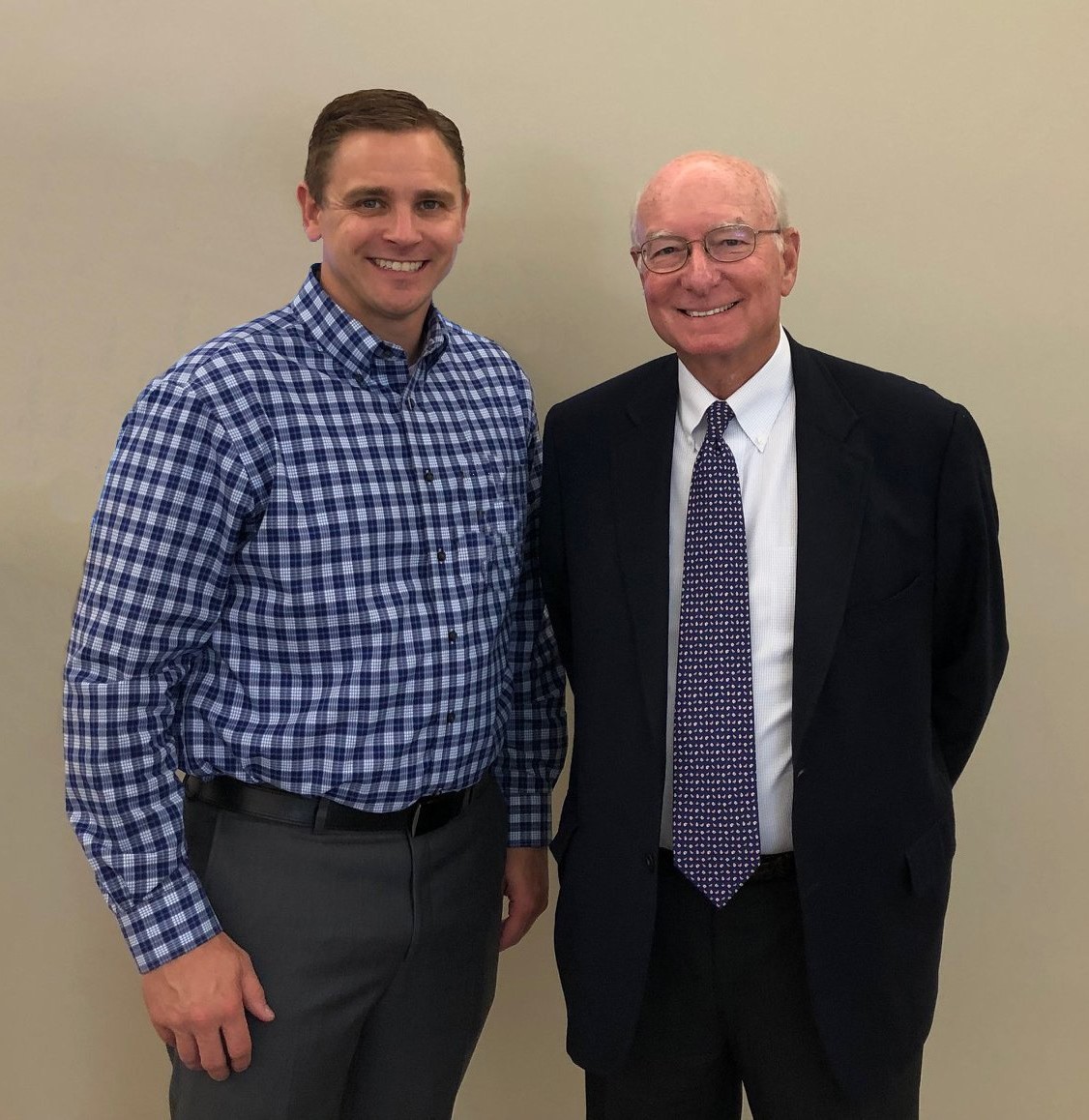 Ivie Johnson Dr. Ivie on left in blue shirt and Dr. Johnson on right in dark suit.