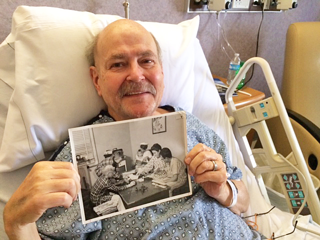 Donald Connelly of Oak Ridge holds a photo of himself taken at then Oak Ridge Hospital during the 1950's