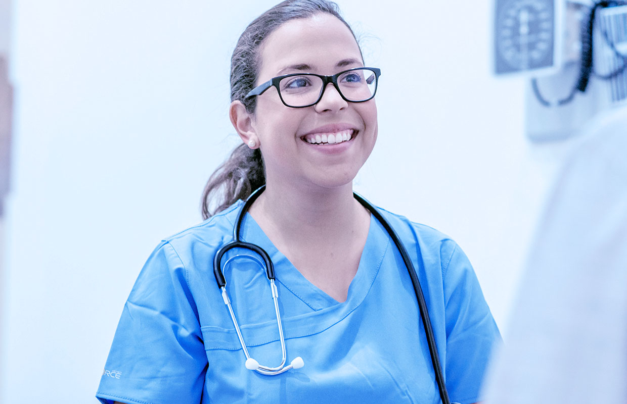 young female nurse smiling
