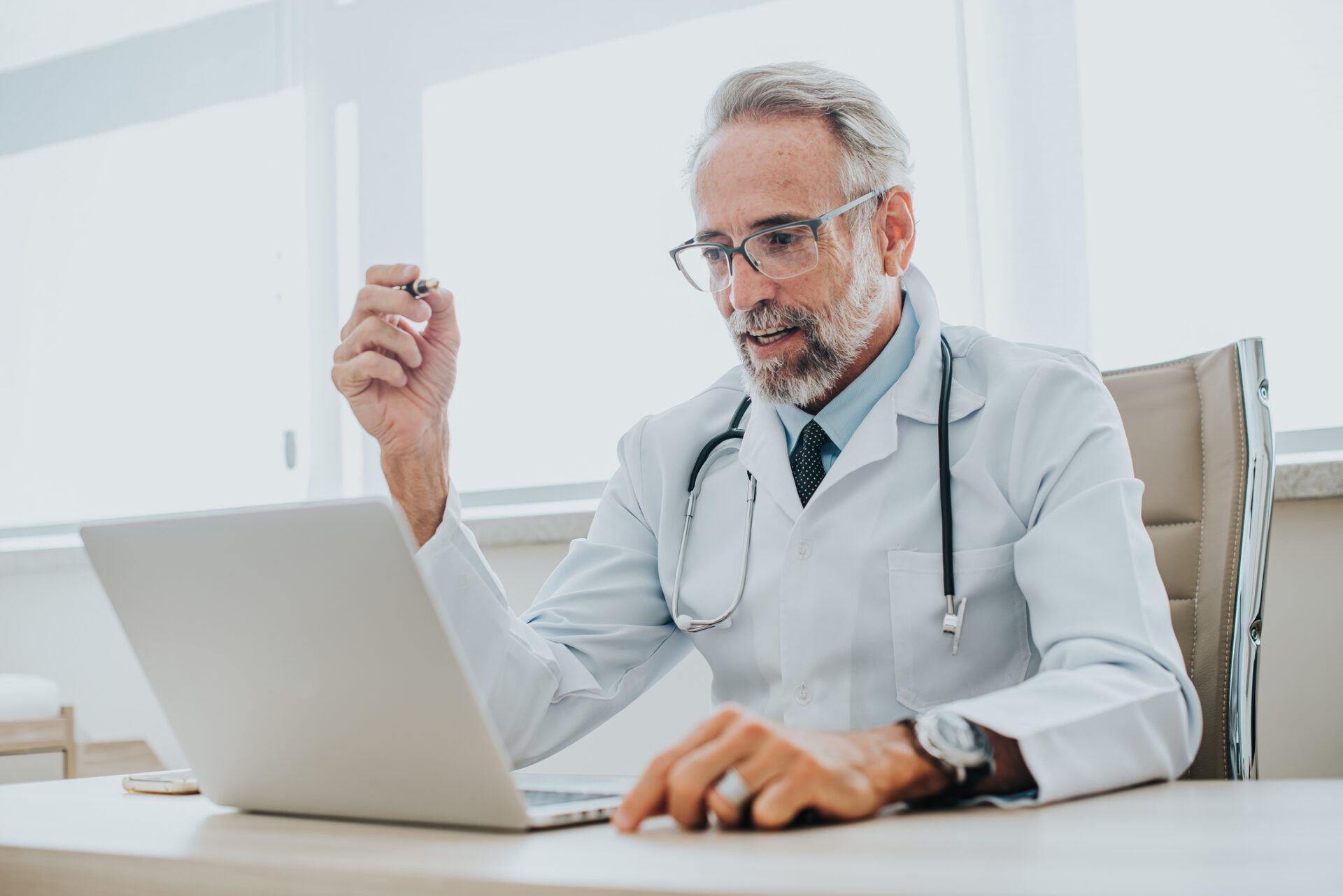 male doctor talks to patient through virtual visit