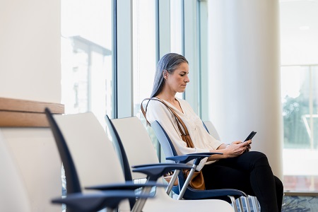 woman waiting in clinic waiting room
