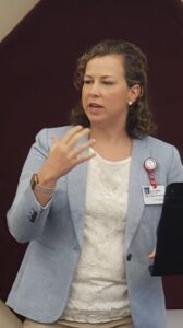 Dr. Alicia Brooks, primary care physician and medical director of Fort Loudoun Primary Care, addresses a group of Tellico Village residents.