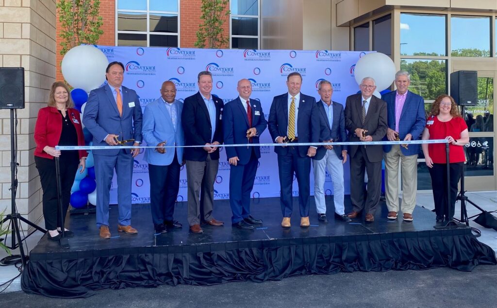 Covenant Health, Morristown-Hamblen Healthcare System and Morristown officials posing before cutting a ribbon