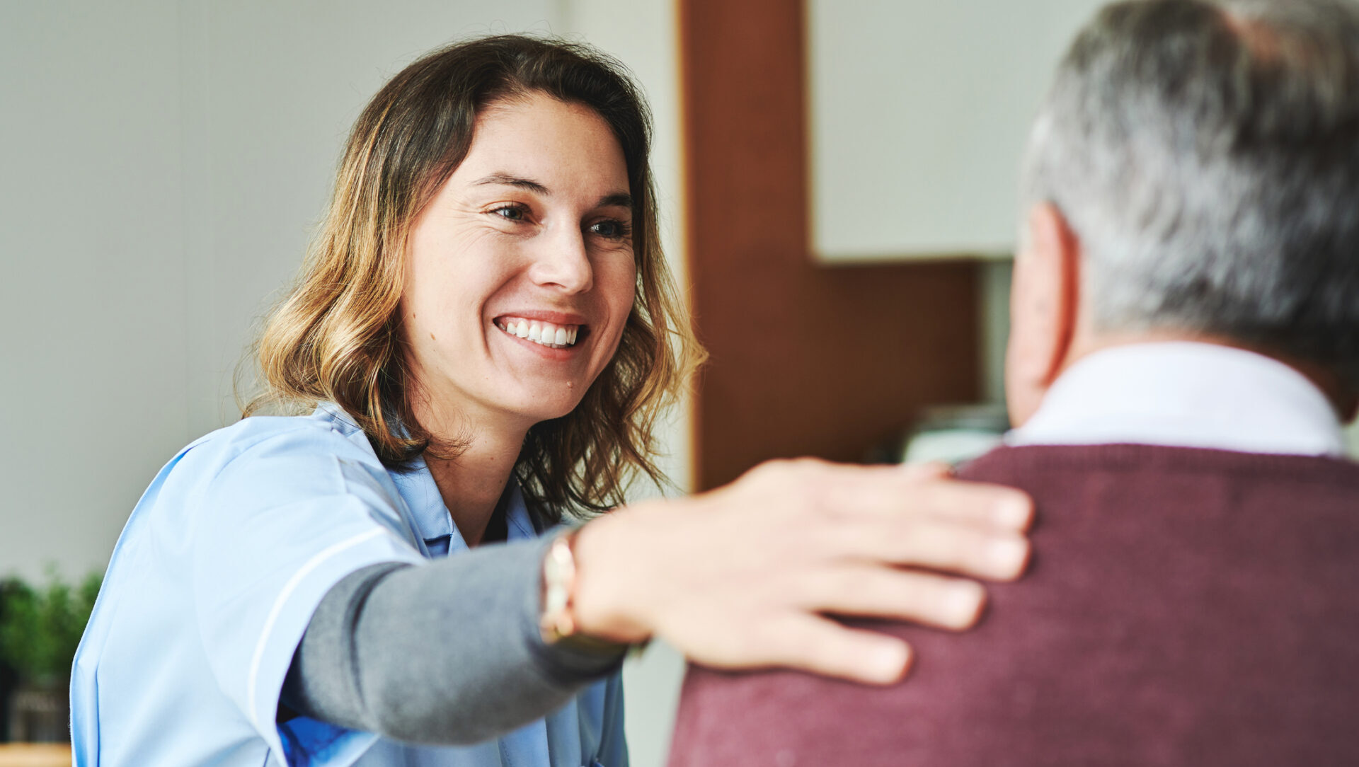 nurse navigator provides support to male patient