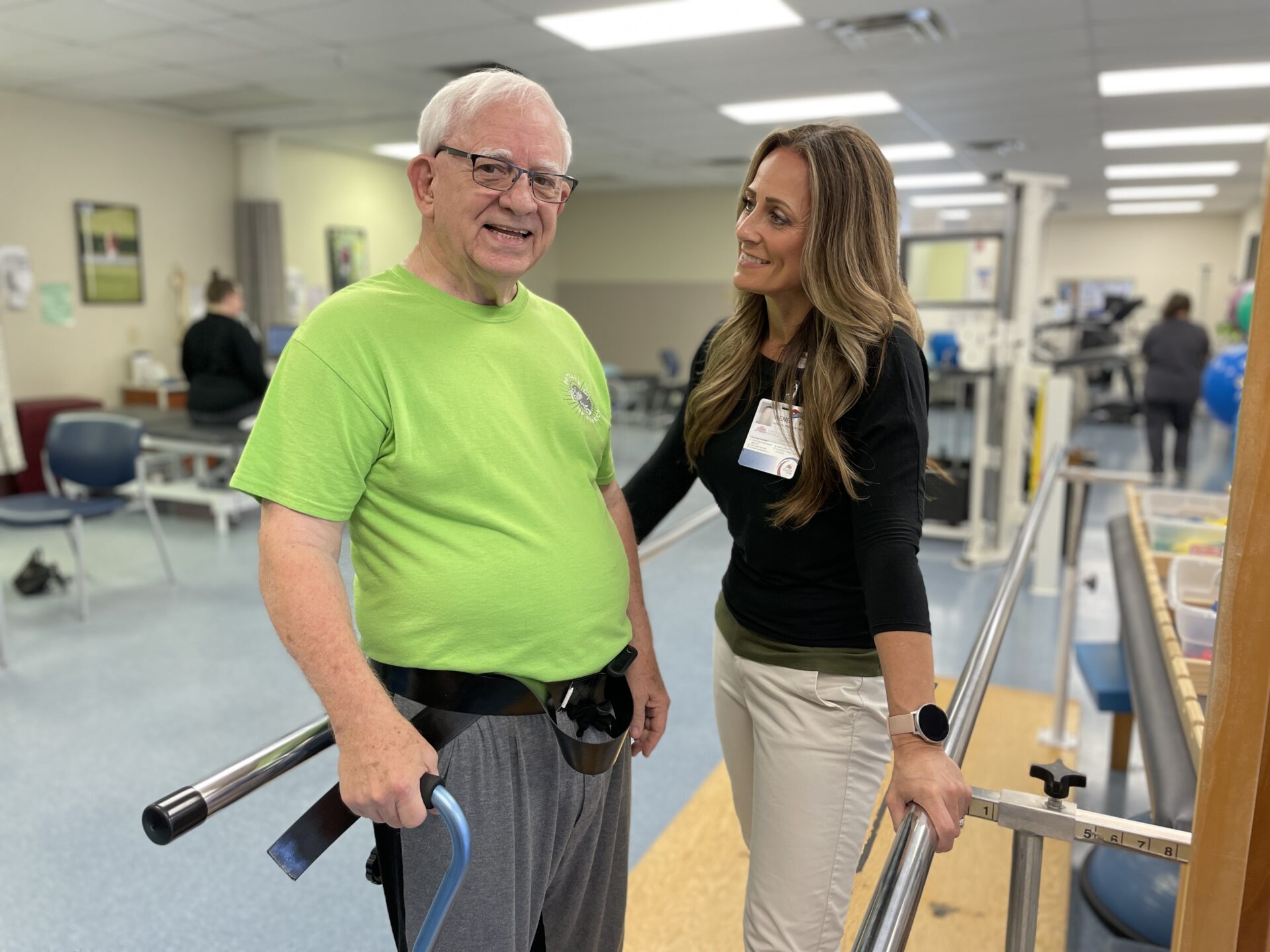 Renee Wilson, Physical Therapy Assistant works with patient Richard Reynolds.