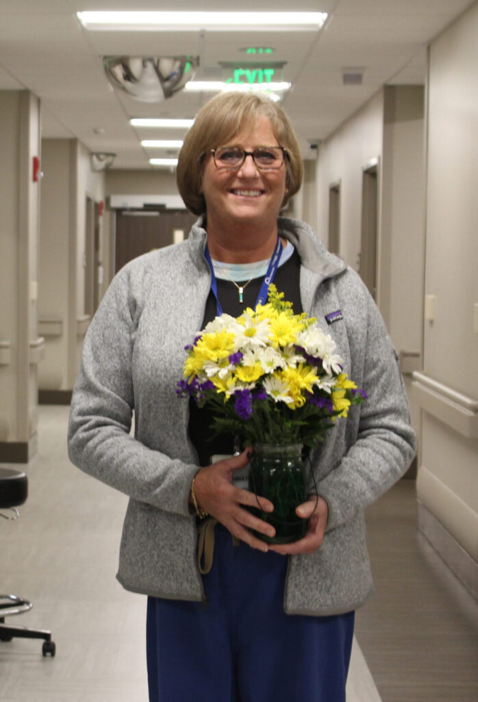 Christy was recognized with a DAISY award and is pictured with her flowers from celebration.