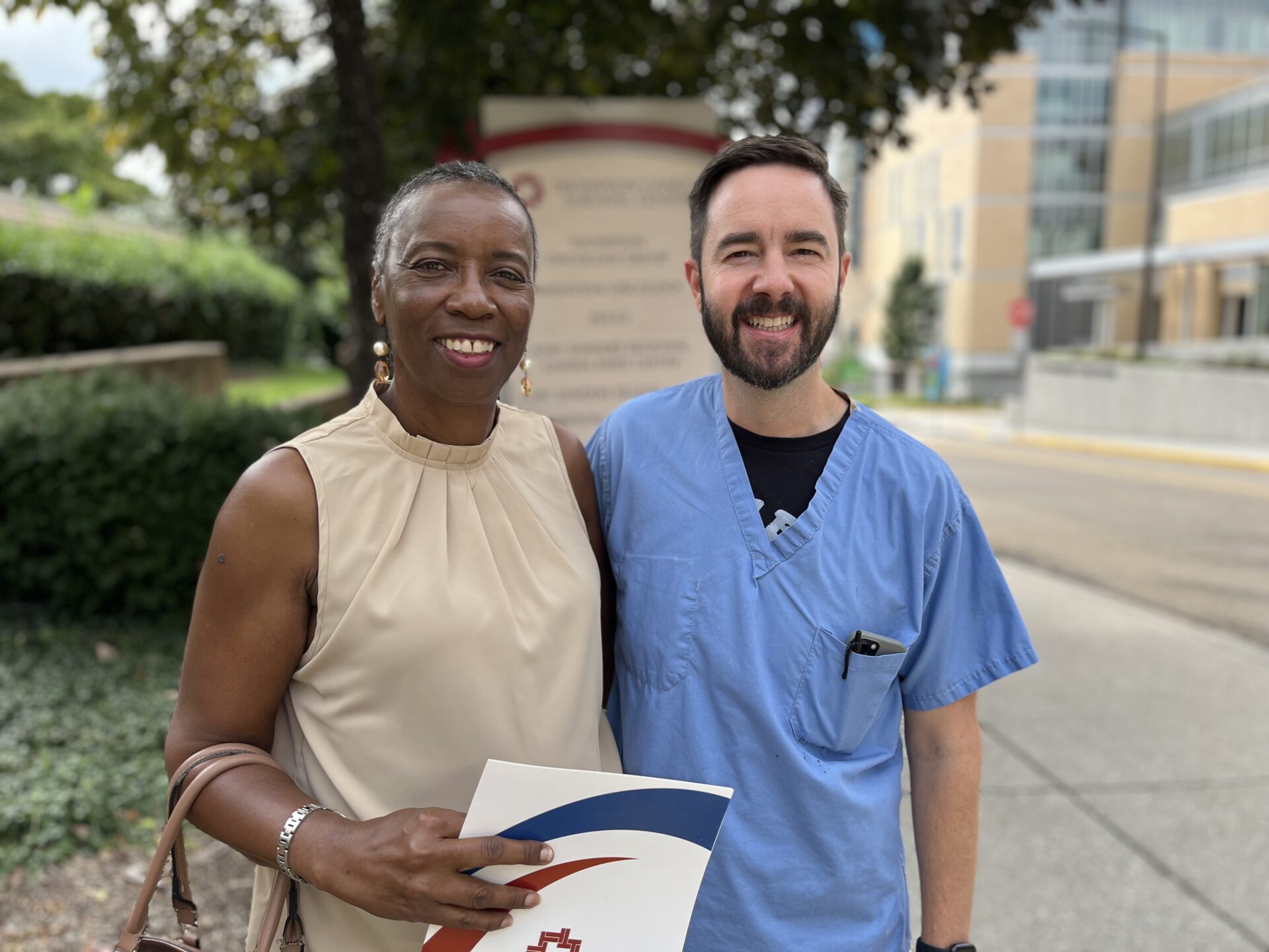 TCSC patient Laurie Blackman poses with her radiation oncologist, Dr. Grant Clark. 