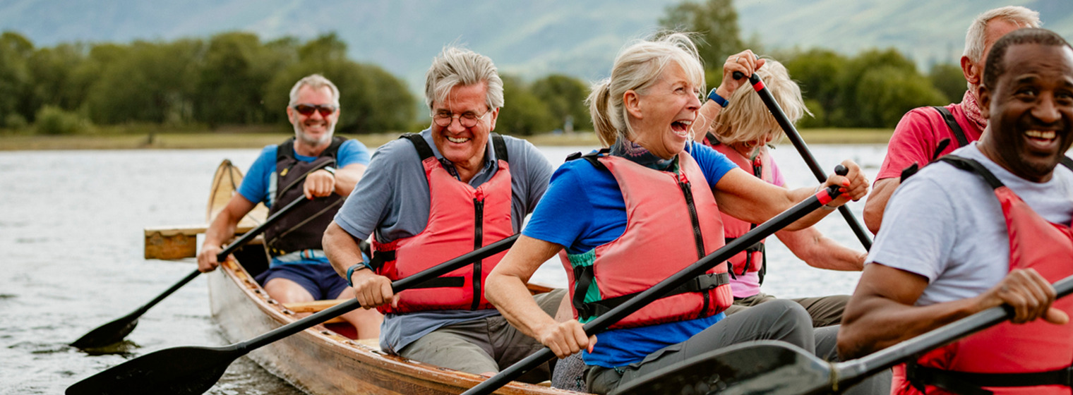 group of elderly people in a canoe