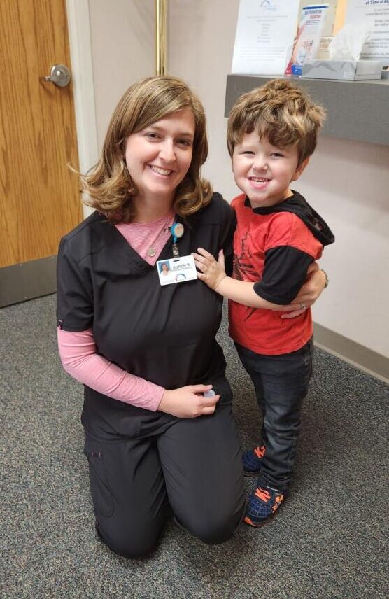 Physical Therapist with pediatric patient Jensen Rains