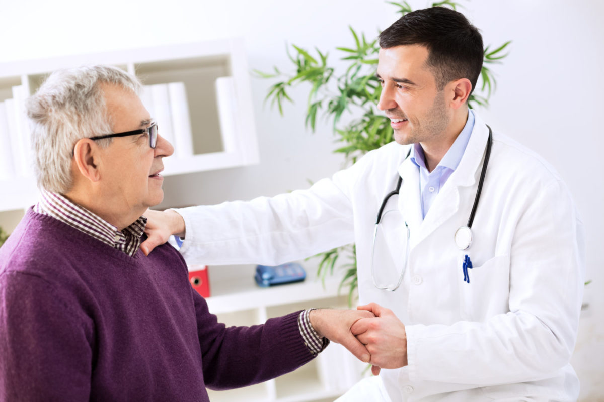 Doctor shaking patients hand