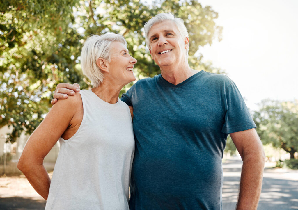 older couple outside walking