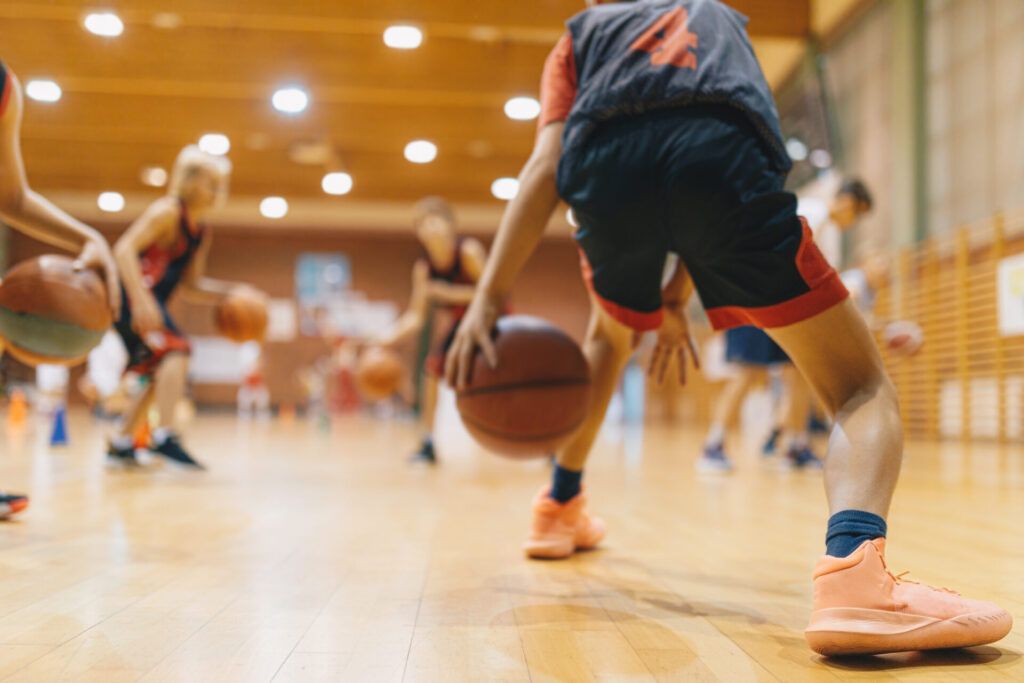 Youth basketball player dribbling the ball during a game