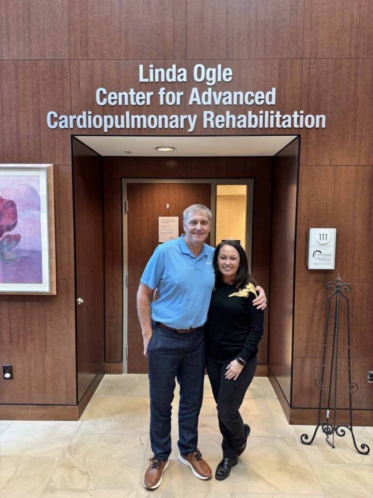 Jamie and Stacey together in front of the entrance to the Linda Ogle Center for Advanced Cardiopulmonary Rehabilitation.